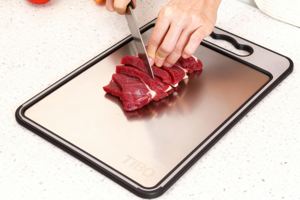The Titanium Cutting Board That Protects You From Harmful Bacteria & Microplastics 